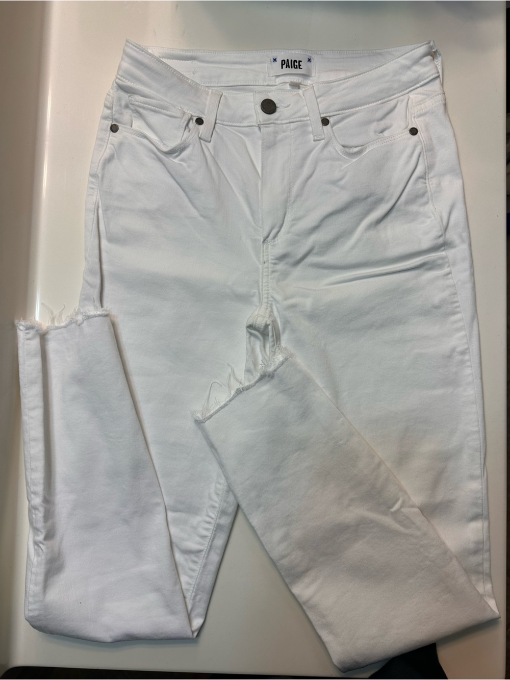 PAIGE White Skinny Jeans with Raw Hem